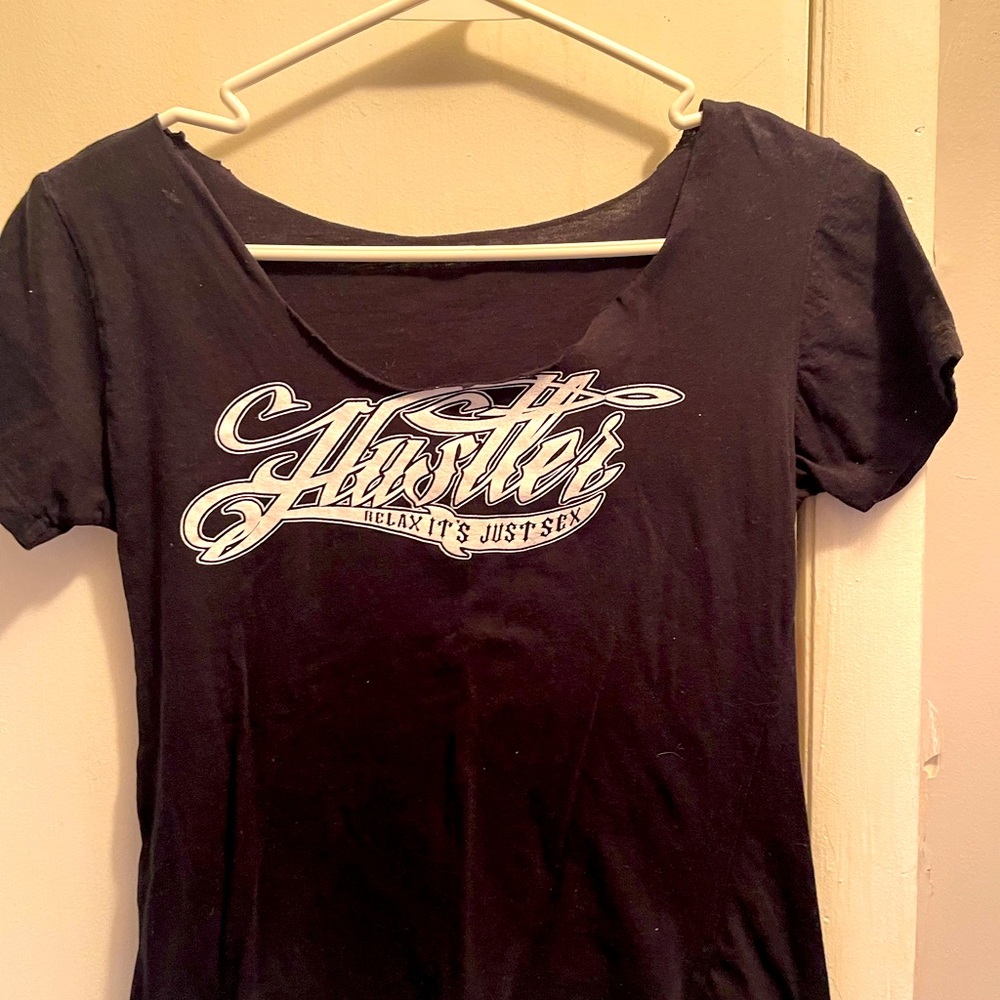 Hustler tee shirt fitted material but a nice brand material.